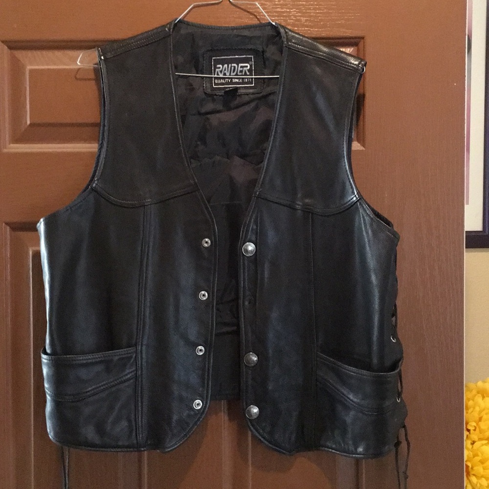 Leather vest.